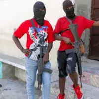 Soldiers of Jimmy Cherizier’s Revolutionary Forces of the G9, now part of the larger Viv Ansanm alliance, in lower Delmas in March 2024. Armed groups have emerged in Haiti’s working-class ghettos due to Haiti’s ruling class’ criminal policies.